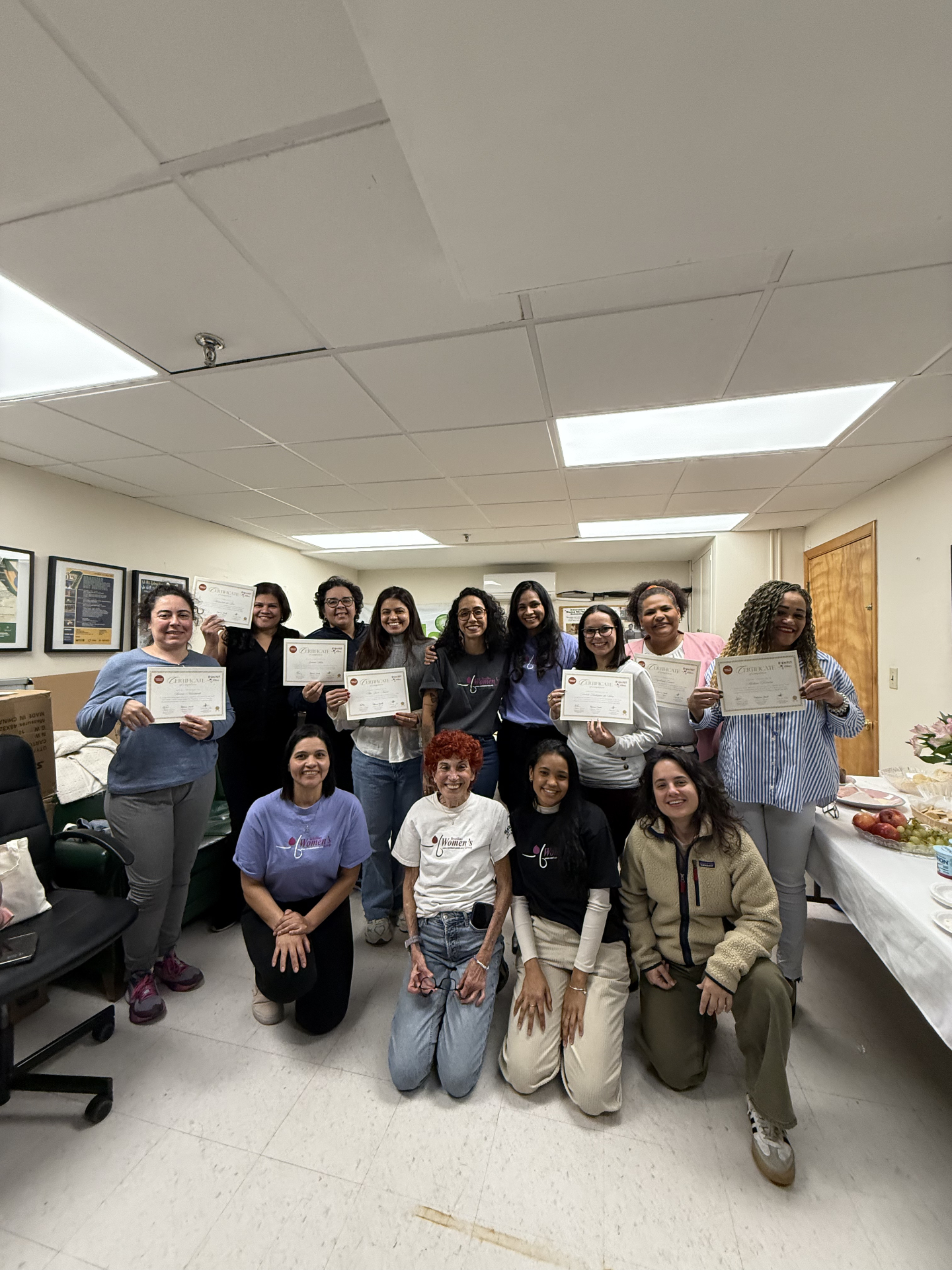 BWG participants celebrating completion of training with certificates